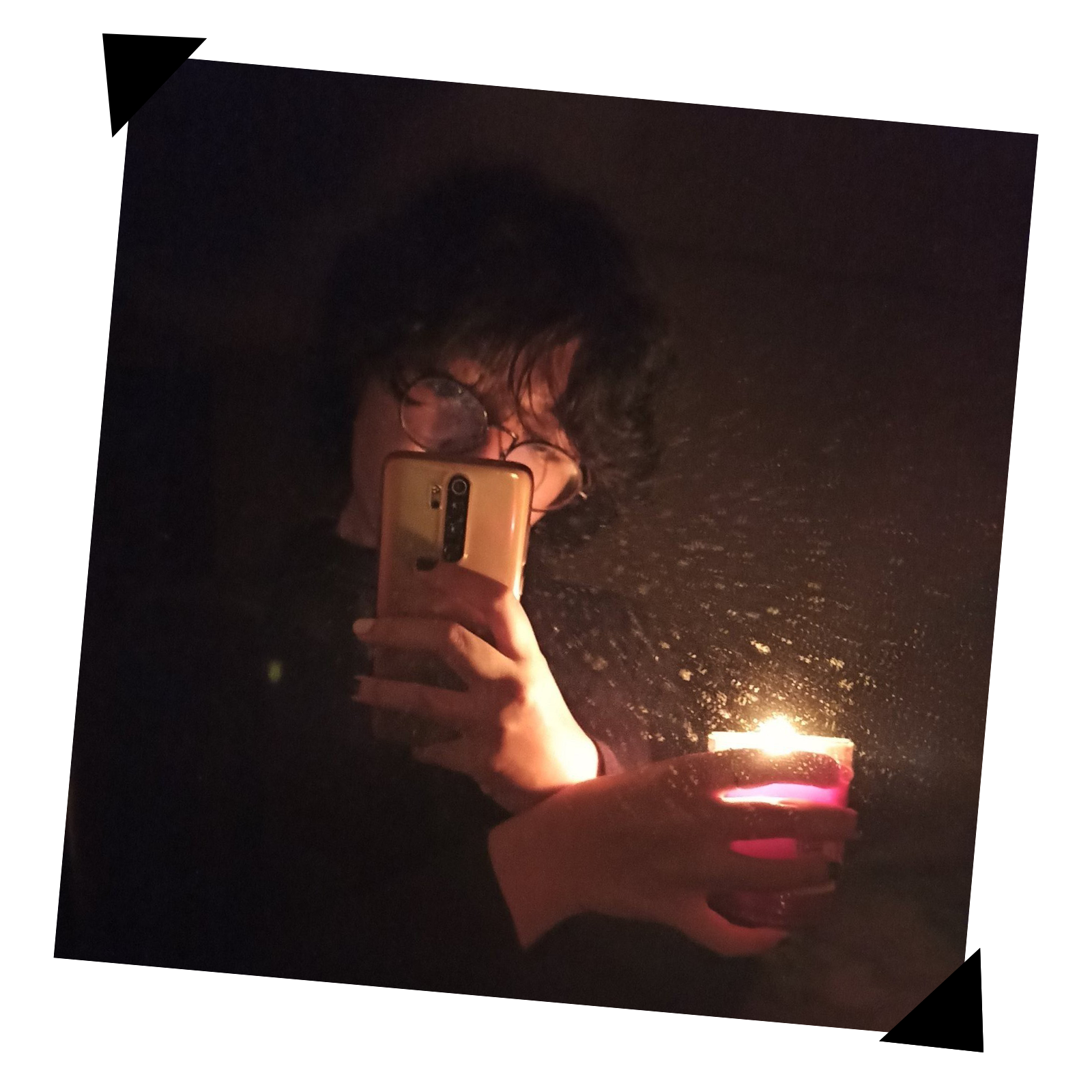 Picture of Gillian Gavino holding a candle